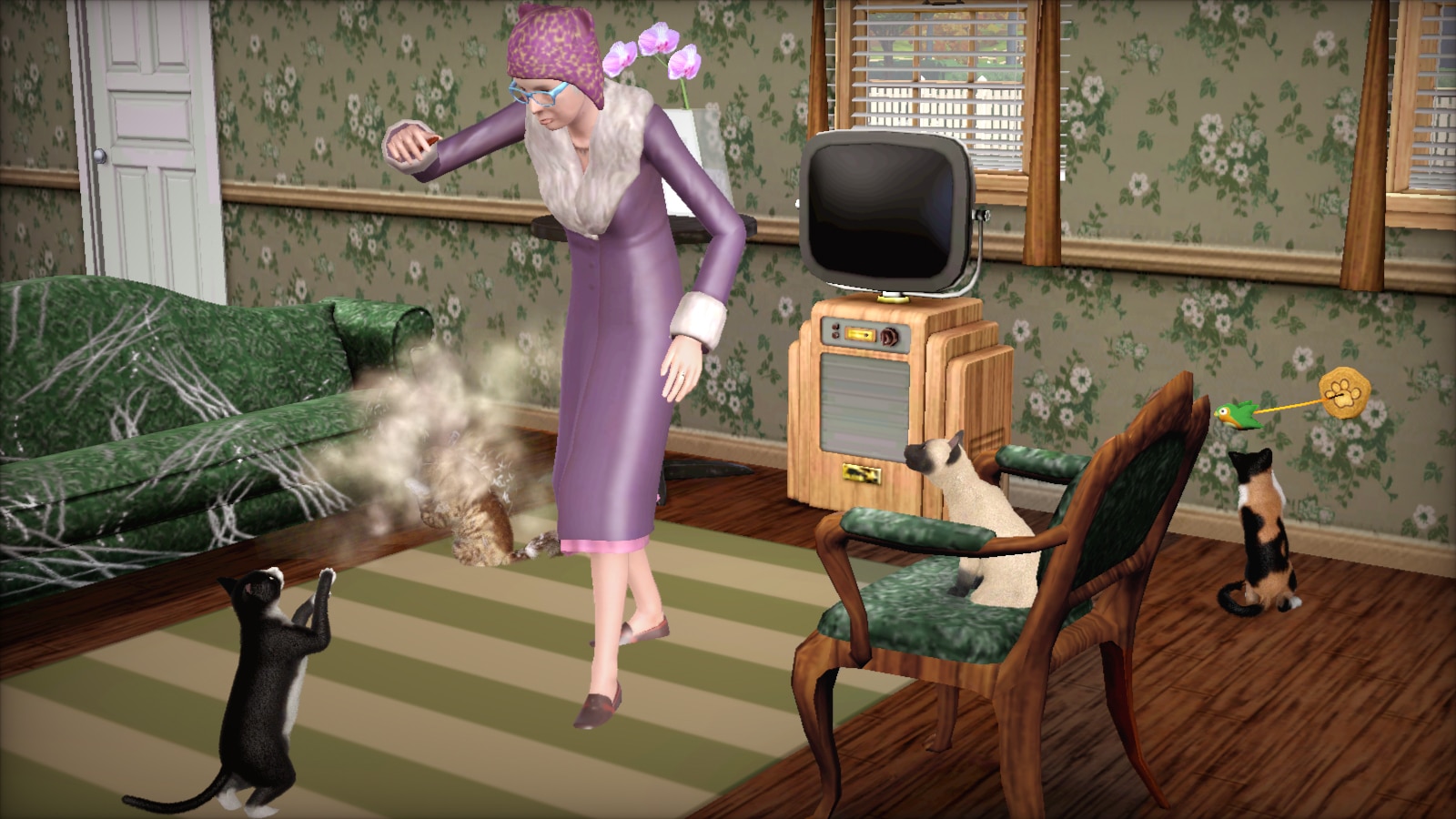 A Sim stands in a room with several cats.