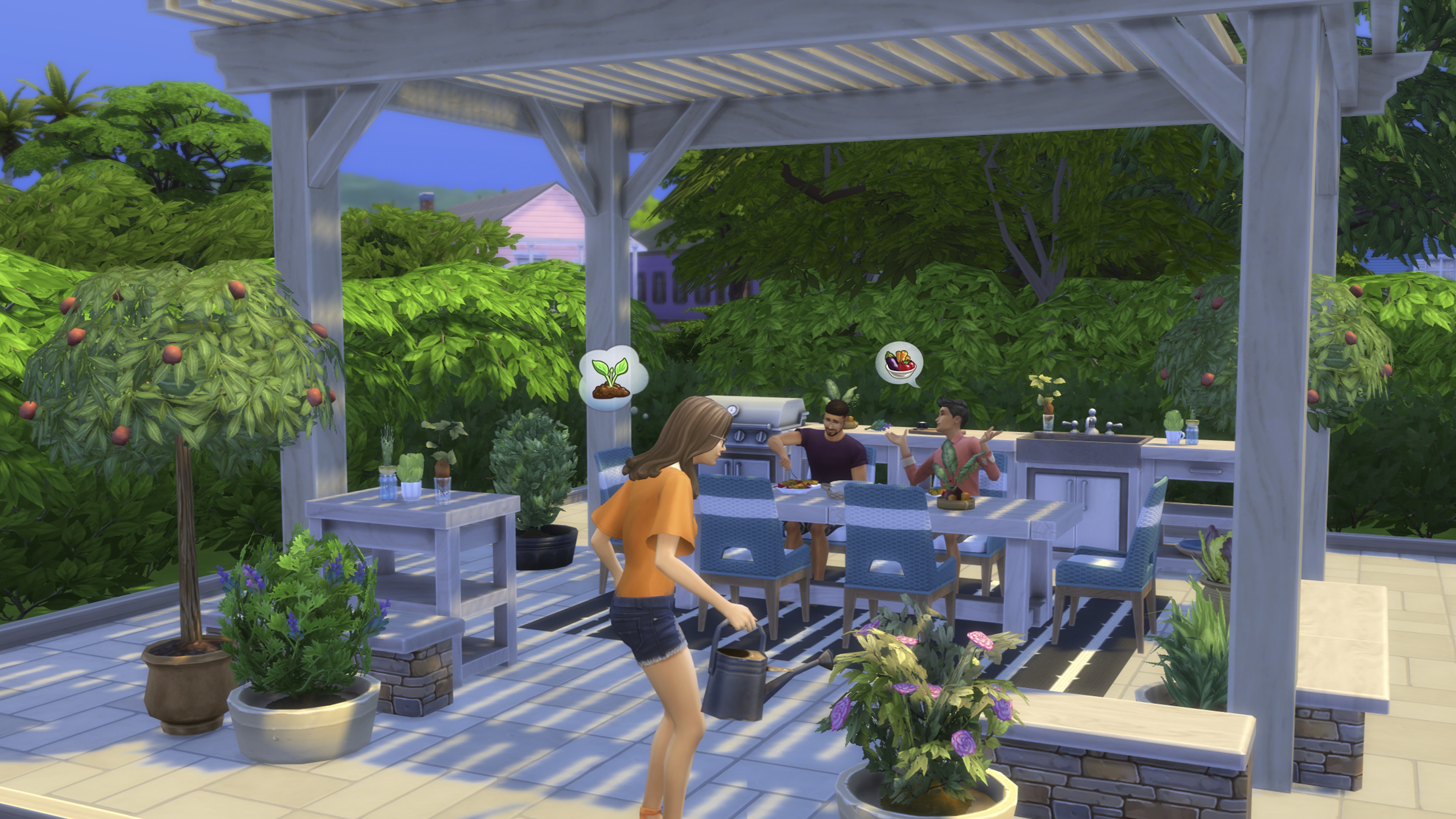 Woman waters plants in a patio with two men dining nearby under a pergola.
