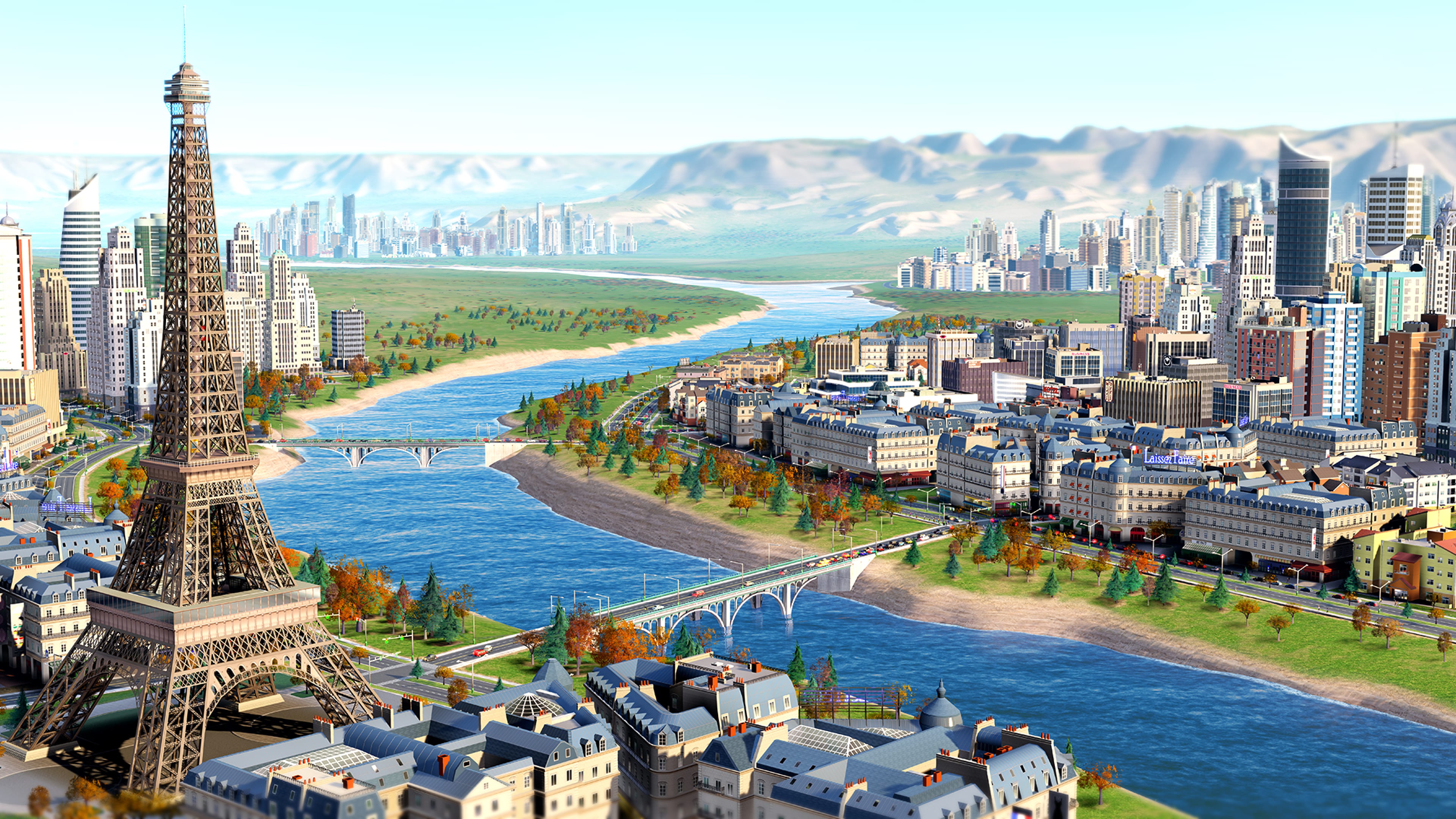 A SimCity region with a river, bridges, the Eiffel Tower, and a large skyline.